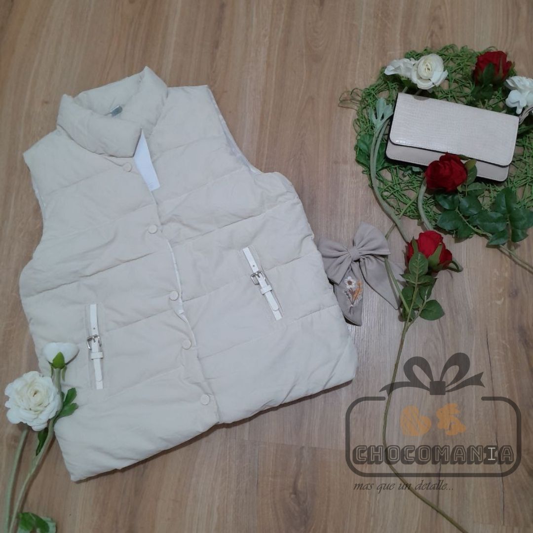 VEST ONE SIZE UP TO A M